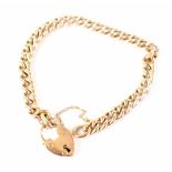 A 9ct gold curb link bracelet with gold heart clasp and safety chain, length 18cm, approx 8.6g.