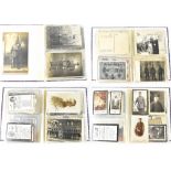 A WWI era album of German postcards, mostly depicting photographs of soldiers, also death cards,