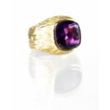 A gentlemen's 9ct gold signet ring set with facet-cut amethyst, maker HB, stamped 9 and 375,