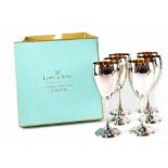 A set of six Queen Elizabeth II hallmarked silver goblets with gilt interiors,