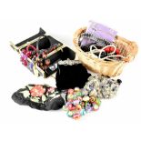 A quantity of contemporary costume jewellery continued in a black and gilt vanity box,