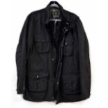 A Barbour wax jacket in black with corduroy trim and quilted interior, size XXL.
