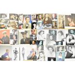 Ten folio albums, each containing an extensive collection of black and white and colour photographs,