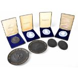 Four boxed Wedgwood jasper ware commemorative oval wall plaques to include Lord Byron,