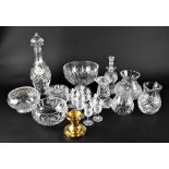 A collection of cut glass and crystal to include a Waterford decanter and eight small glasses with