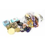 A large quantity of costume jewellery to include coin bracelet, necklaces, fashion rings,