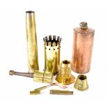 A collection of trench art to include two artillery shells,