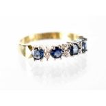 A 9ct gold and diamond half eternity ring,