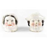 Two 19th century Continental figural slip porcelain money boxes in the form of a man and woman,