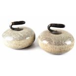 A pair of late 19th/early 20th century polished granite curling stones,