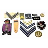 A quantity of British Army cloth insignia badges.
