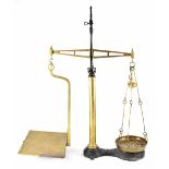 A vintage black cast iron and brass set of banking scales, height 88cm.