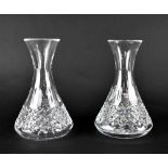 A pair of Waterford Crystal vases with hobnail decoration to the base, height 24cm (2).