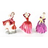 Three Royal Doulton figures comprising HN2327 'Katrina', HN2152 'Adrienne' and HN3253 'Cheryl',