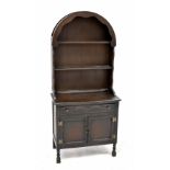 A small 20th century oak dresser with curved enclosed plate rack on a base of single drawer and