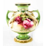 A Royal Worcester twin-handled vase of bulbous form painted with roses on a cream ground within