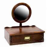 A modern mahogany dressing table jewellery box with circular swivel mirror and inner sliding