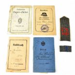 A collection of WWI booklets to include 'Ausweis', 'Military Pas', 'Solabuch', 'Siges-Laieder',