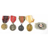 A German West Wall Medal, a Russian Front Medal, a Romanian Fight Against Bolshevism Medal,