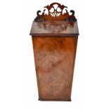 A 19th century cross-banded mahogany candle box of square tapering form with pierced frieze and