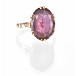 A 9ct gold amethyst ring, the oval cut claw-set amethyst on 9ct gold shank, size R, approx 5.2g.