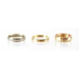Three gold rings to include a 22ct band, size M, approx 2.