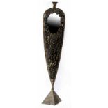 A metal hall stand in the form of a fish, with brazed decoration, central mirror and three hooks,