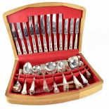 A mahogany-cased canteen of plated flatware containing a small quantity of unmatched flatware.