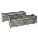 A pair of late 19th/early 20th century lead trough planters,