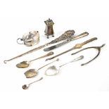 A quantity of mixed silver items to include a mustard (lacking liner), pepperette, four spoons,