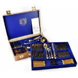 A Solingen twelve place setting gold plated canteen of cutlery,