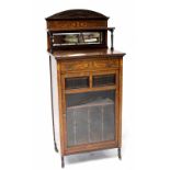 An Edwardian rosewood music cabinet,