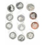 Twelve Queen Mother silver commemorative coins, each commemorating a different Commonwealth visit,