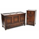 A 20th century oak linenfold coffer with single drawer on bun feet, height 59cm, width 100cm,