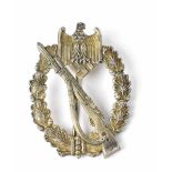 A German Silver Infantry Assault Badge, maker's initials CW.