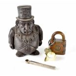 A vintage cast iron Transvaal moneybox in the form of a distinguished gentleman,