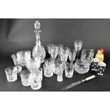 A quantity of cut glass and crystal to include a decanter, whisky glasses, wine glasses,