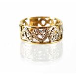 A 9ct yellow gold love heart ring set with small diamond chips, size P, approx 3.3g.