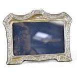 An Elizabeth II hallmarked silver photograph frame, height 14cm, Sheffield 1993.