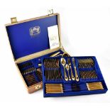 A Solingen twelve place setting gold plated canteen of cutlery,