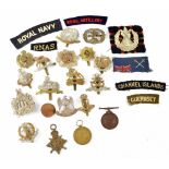 A quantity of military cap badges to include King's Own Scottish Borders, Royal Scots Greys,