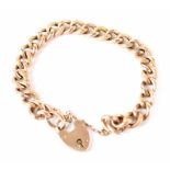 A 19th century 9ct gold belcher link bracelet with heart-shaped clasp and safety chain, length 19cm,