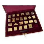 A silver gilt replica stamp proof set,