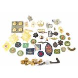 A quantity of various mixed British Army cap badges, buttons,