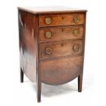 A George III mahogany chest of drawers/commode, the front with three graduated drawers,