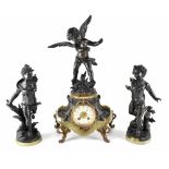 A French onyx and spelter clock garniture, the clock with ivorine dial set with Arabic numerals,