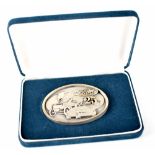 A Ford Motor Company employee twenty-five year service award belt buckle in presentation case and