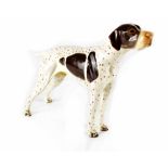 A Nymphenburg porcelain model of a pointer in a poised stance, impressed numbers,