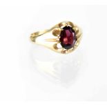 A gentlemen's hallmarked 9ct gold garnet-set ring, size S, approx 2.8g.