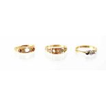 Three rings comprising an 18ct gold ring and a 15ct gold ring, approx combined 3.